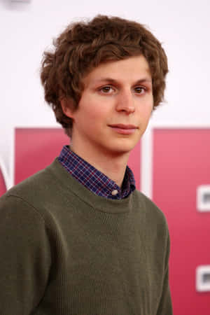 Award-winning Actor Michael Cera Posing For A Professional Photoshoot. Wallpaper