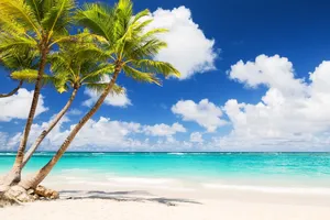 Azure Bliss: Sun, Sand, And Sea Vacation Wallpaper