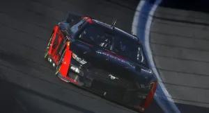 B.j. Mcleod Racing In His Black Nissan Gt-r Wallpaper