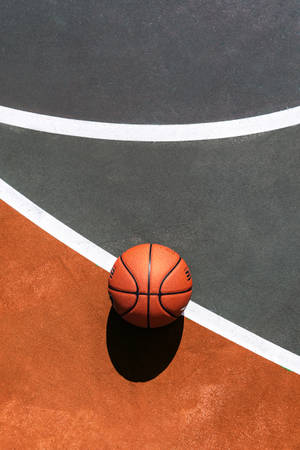 Ball On Basketball Court Top Focus Wallpaper