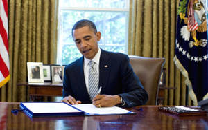 Barack Obama In Office At Washington Wallpaper