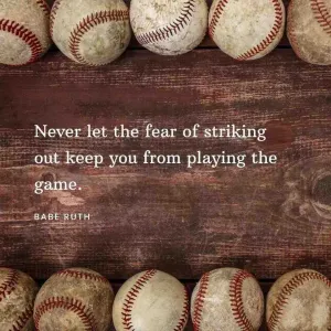 Baseballs With The Quote Never Let The Fear Of Striking Out Keep You From Playing The Game Wallpaper