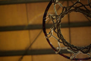 Basketball Ring On Gold Ceiling Wallpaper