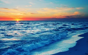 Beach Waves Behind Sunset Hd Wallpaper