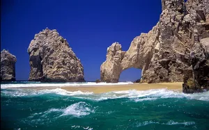 Beach With Rock Formations Wallpaper