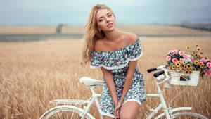 Beautiful Blonde On A Bicycle Wallpaper