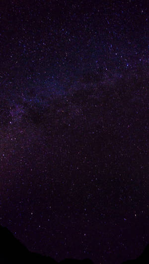 Beautiful Dark Purple Galaxy In Space Wallpaper