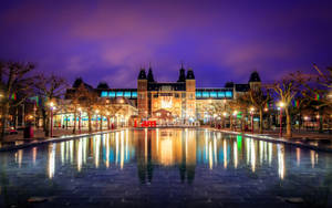 Beautiful Illuminated Rijksmuseum At Night Wallpaper