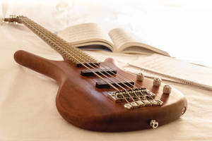 Beautiful Music Brown Bass Guitar Wallpaper