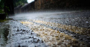 Beautiful Rain Pouring On The Road Wallpaper