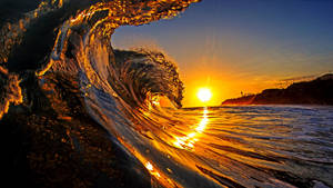 Beautiful Sunset And Waves Wallpaper