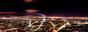 Beautiful View Of Paris At Night Wallpaper