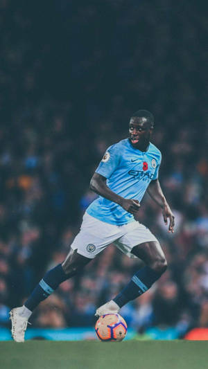 Benjamin Mendy Running In The Field Wallpaper