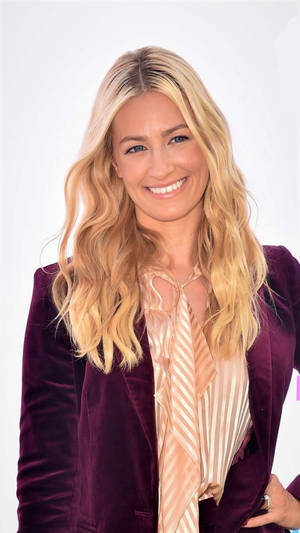 Beth Behrs In Purple Blazer Wallpaper