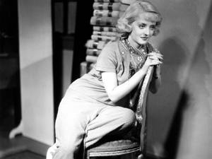 Bette Davis On A Chair Wallpaper