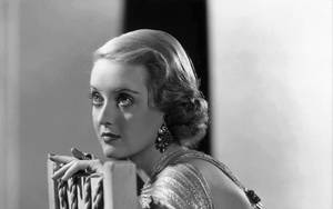 Bette Davis With Short Curly Hair Wallpaper