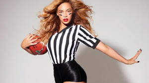 Beyonce In American Football Outfit Wallpaper