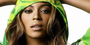 Beyonce In Green Hoodie Wallpaper