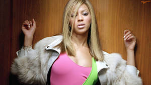 Beyonce In Neon Outfit Wallpaper