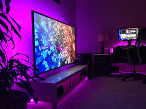 Big Television Inside A Neon Room Wallpaper