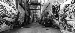 Black And White Graffiti Walls And A Linear Road Wallpaper