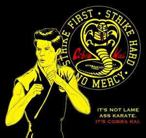 Black And Yellow Cobra Kai Quote Wallpaper