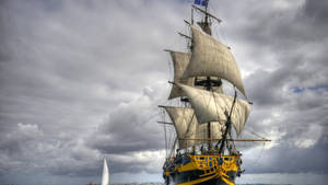 Black And Yellow Sailing Ship Wallpaper