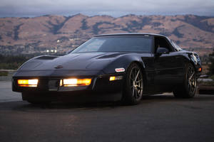 Black C4 Corvette In The Mountains Wallpaper