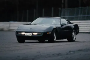 Black C4 Corvette On The Road Wallpaper