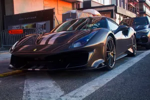Black Ferrari On Street Wallpaper