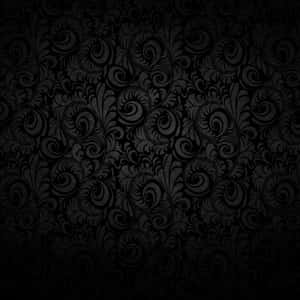 Black Ipad With Spiral Abstract Patterns Wallpaper