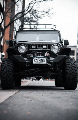 Black Jeep Wrangler With Huge Tires Wallpaper
