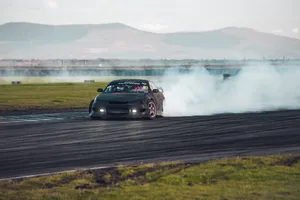 Black Porsche Sportscar Drifting Wallpaper