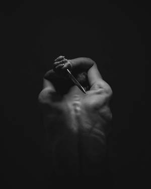 Black Spooky Paranormal Man Dagger Wallpaper