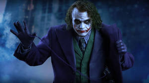 Black Ultra Hd Joker Raising Hand Wallpaper