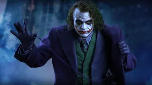 Black Ultra Hd Joker Raising Hand Wallpaper