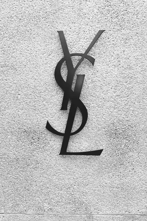 Black Ysl At Concrete Wall Wallpaper