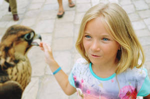 Blonde Girl & Bird In Tunisia Wallpaper