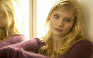 Blonde Woman Contemplative Gaze Wallpaper