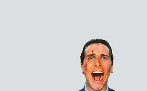 Blood Splattered Man Screaming.jpg Wallpaper