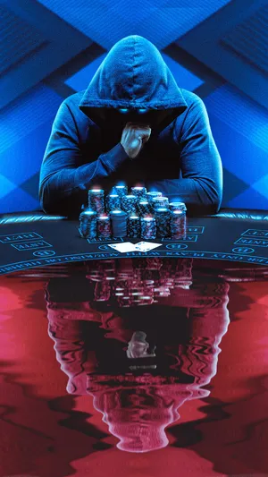 Blue And Red Man Wearing Hoodie Looking At Baccarat Game Wallpaper
