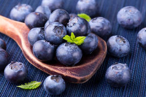 Blueberries On Wooden Spoon Wallpaper