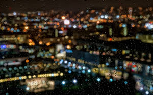 Blurry City View After The Rain Wallpaper