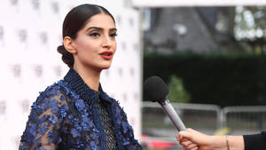 Blushing Sonam Kapoor Wallpaper