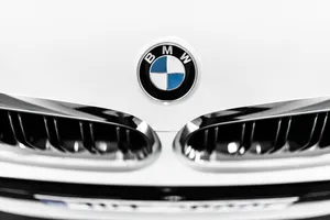 Bmw Luxury Car Logo On Hood Landscape Wallpaper