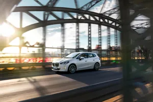 Bmw Luxury Car On A Bridge Wallpaper