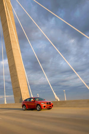 Bmw X6 M On A Road Bridge Wallpaper