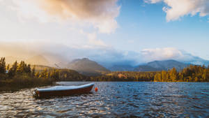 Boat Sailing In Slovakia's Sea Wallpaper