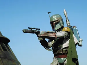Boba Fett Holding Rifle Wallpaper
