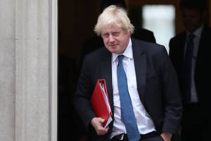 Boris Johnson Holding A Red Folder Wallpaper